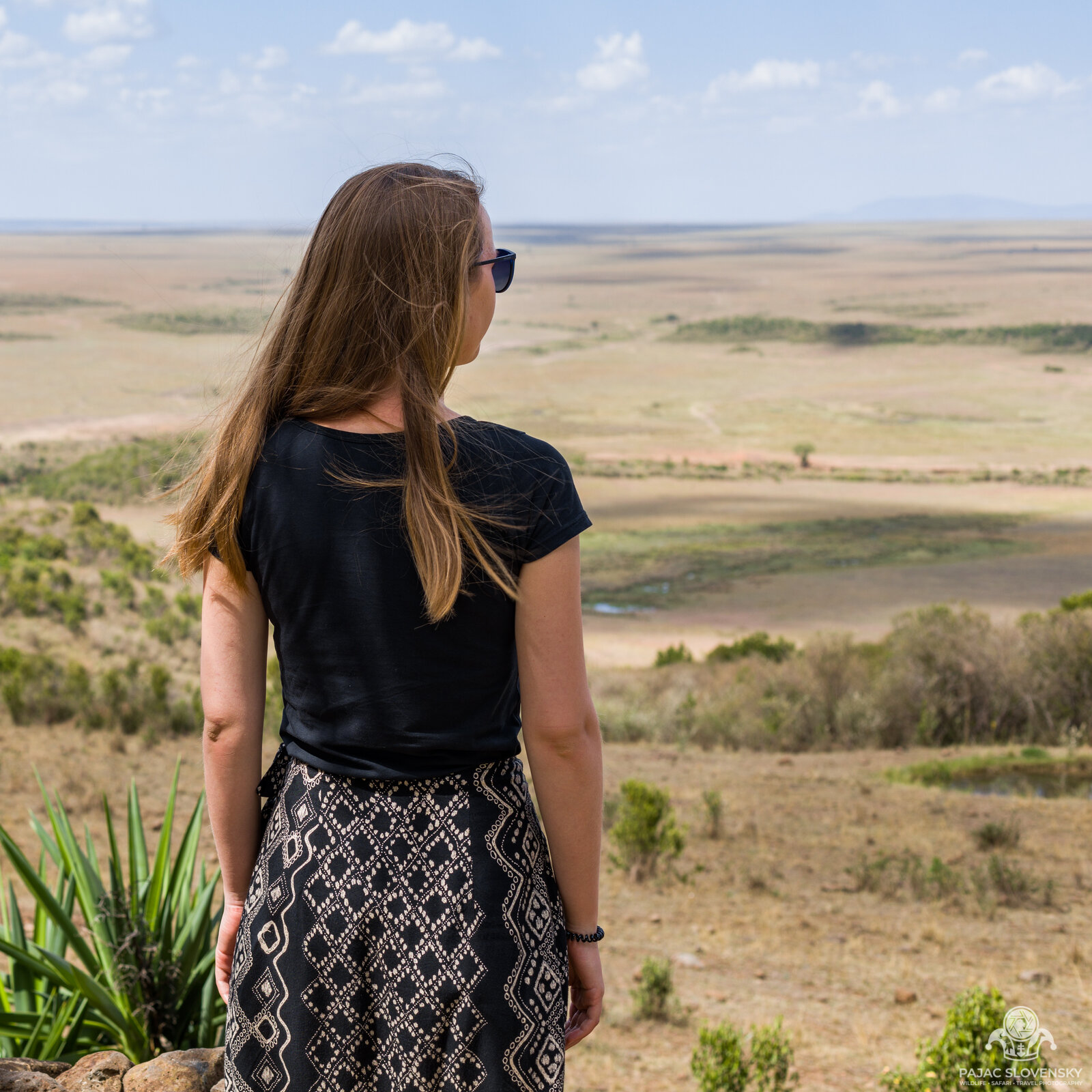 The second half of the team overlooking the Masai Mara plains
