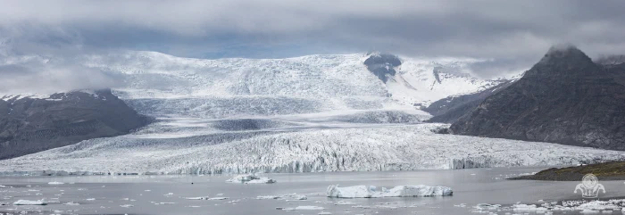 Panorama of the Fjallsárlón icefall descending from Vatnajökull