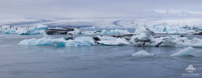 Panorama of icebergs drifting across Jökulsárlón glacier lagoon