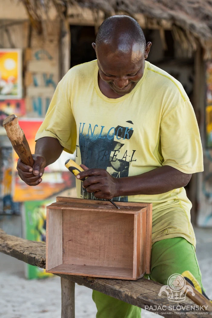 Finishing strokes along the carved front