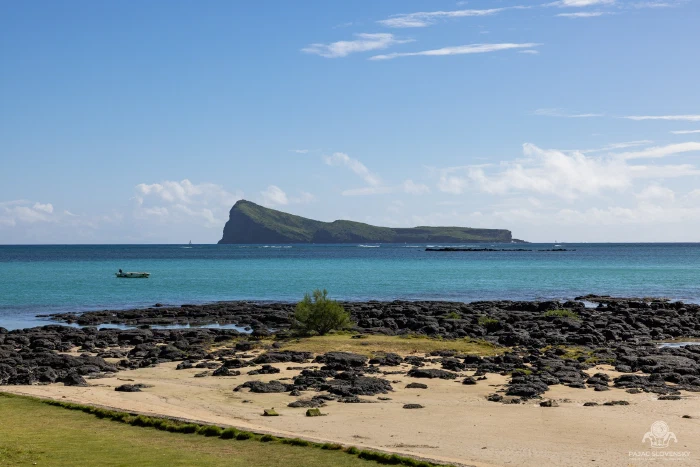 Coin de Mire across the water from the lava shore at Cap Malheureux