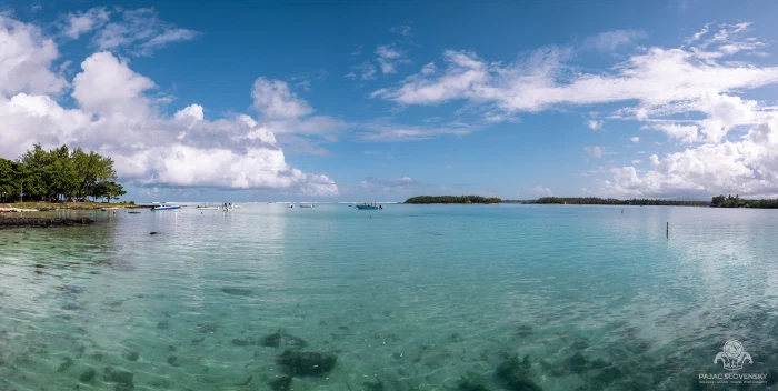 Panorama of the shallow turquoise lagoon on the northern coast