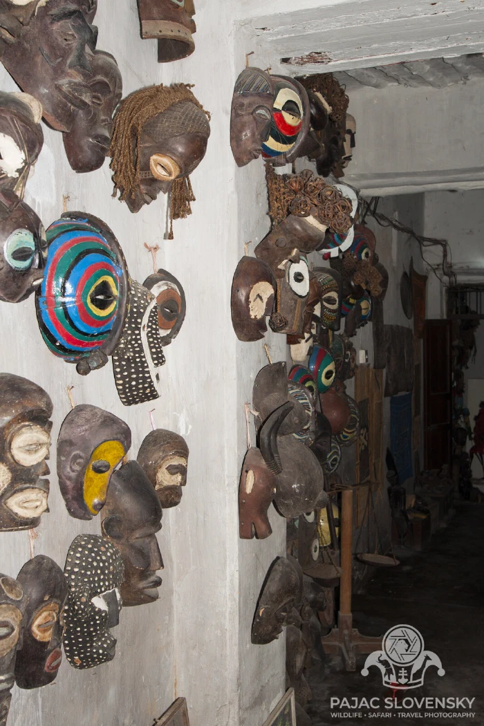Rows of carved masks in a Stone Town curio shop